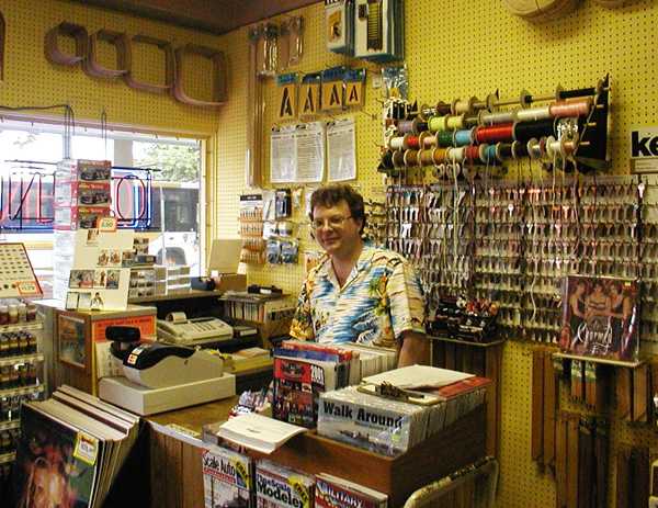 Here's Tom manning the cashier. He also does keys and sells trading cards.